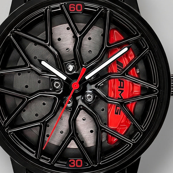 Primo piano del cerchio e della pinza incisa AMG, orologio Mercedes-AMG G63