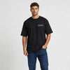 T-shirt Volkswagen Beetle California Aircooled noir vu de face en plan rapproché avec logo Tourismo