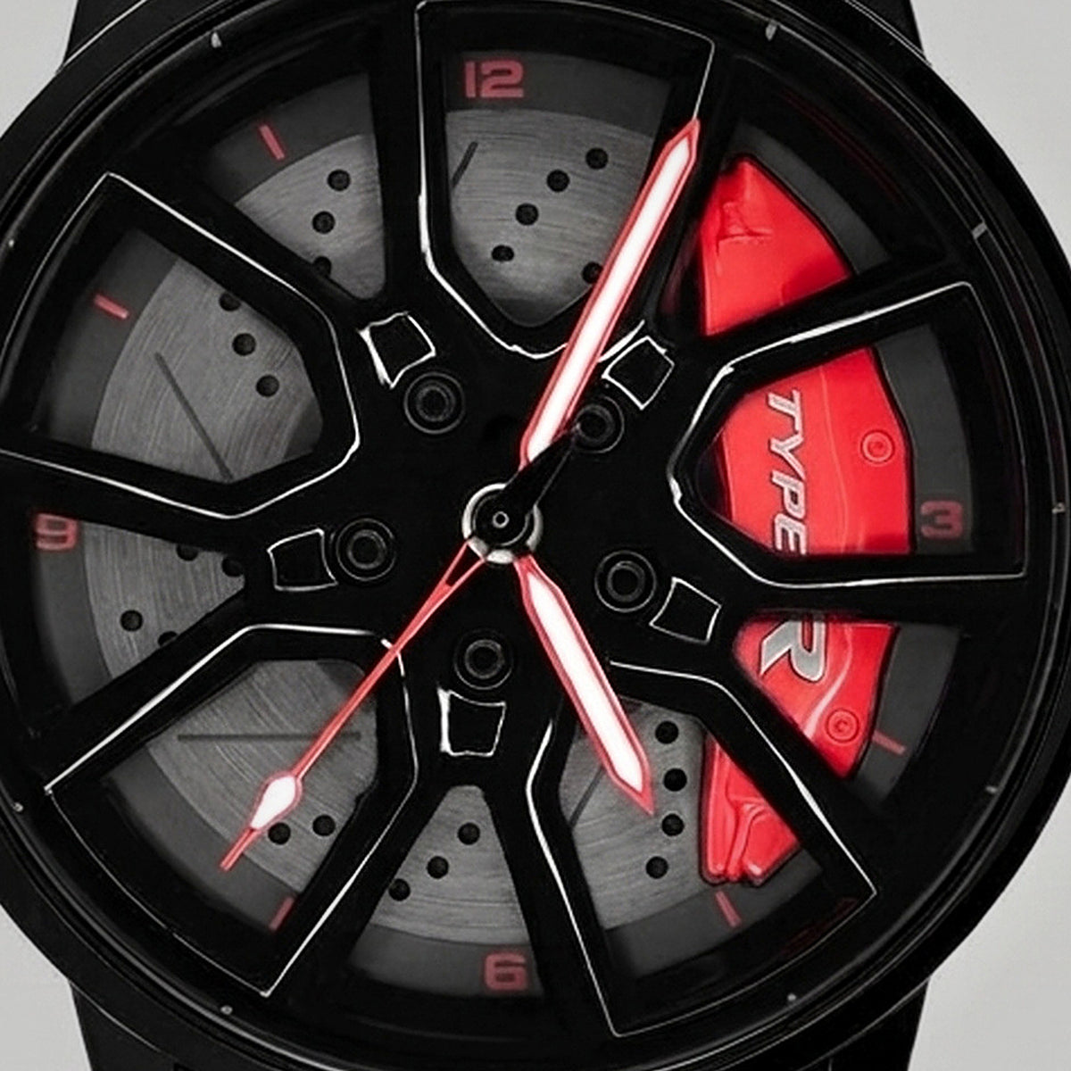 Primo piano del cerchio e della pinza incisa TYPE R, orologio Honda Type R