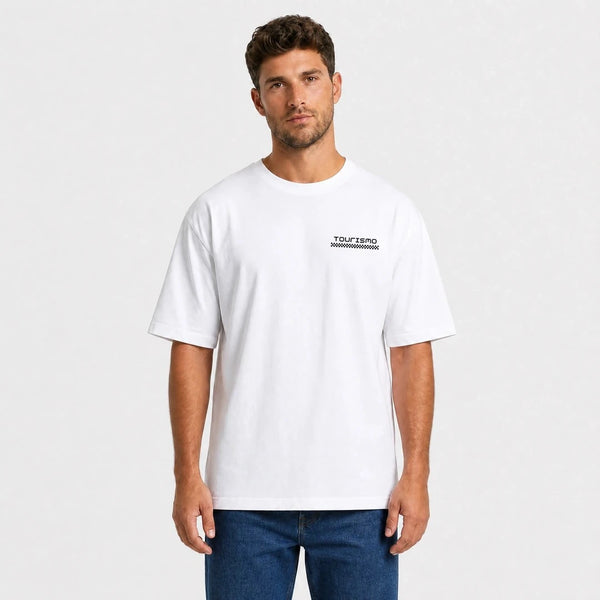 T-shirt Jaguar D-Type Le Mans N°6: Born for Le Mans, bianca, vista frontale, primo piano, con logo Tourismo