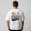 T-shirt blanc oversize Aero Estate avec print dos 911 GT3 RS bleue devant villa méditerranéenne, Tourismo Clothing