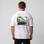 T-shirt blanc oversize Grand Touring Club avec print dos 911 Turbo noire devant café de la Riviera, Tourismo Clothing